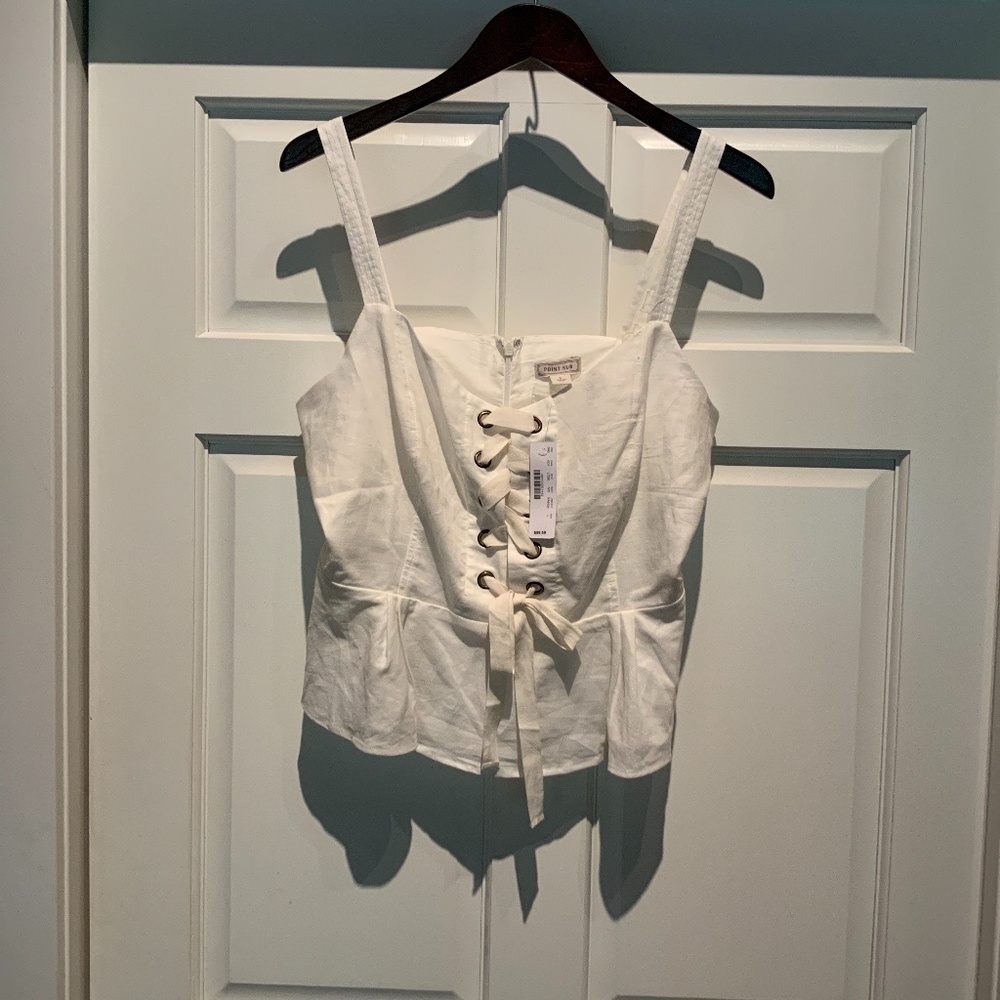 White corset-laced sleeveless top